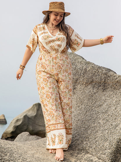 Plus Size V-Neck Flutter Sleeve Wide Leg Jumpsuit - UrbanEthereal