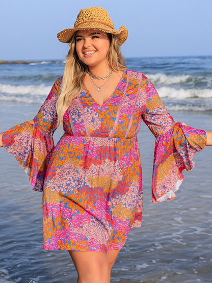 Plus Size Ruched Printed Long Sleeve Dress - UrbanEthereal