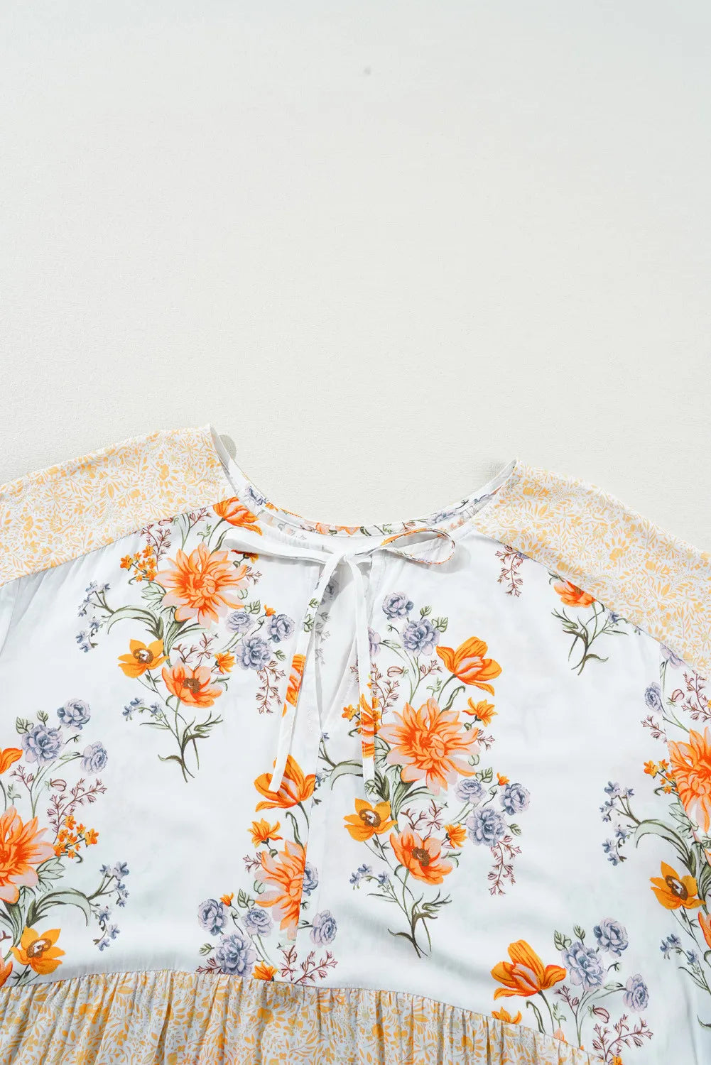 Plus Size Printed Tie Neck Long Sleeve Blouse - UrbanEthereal