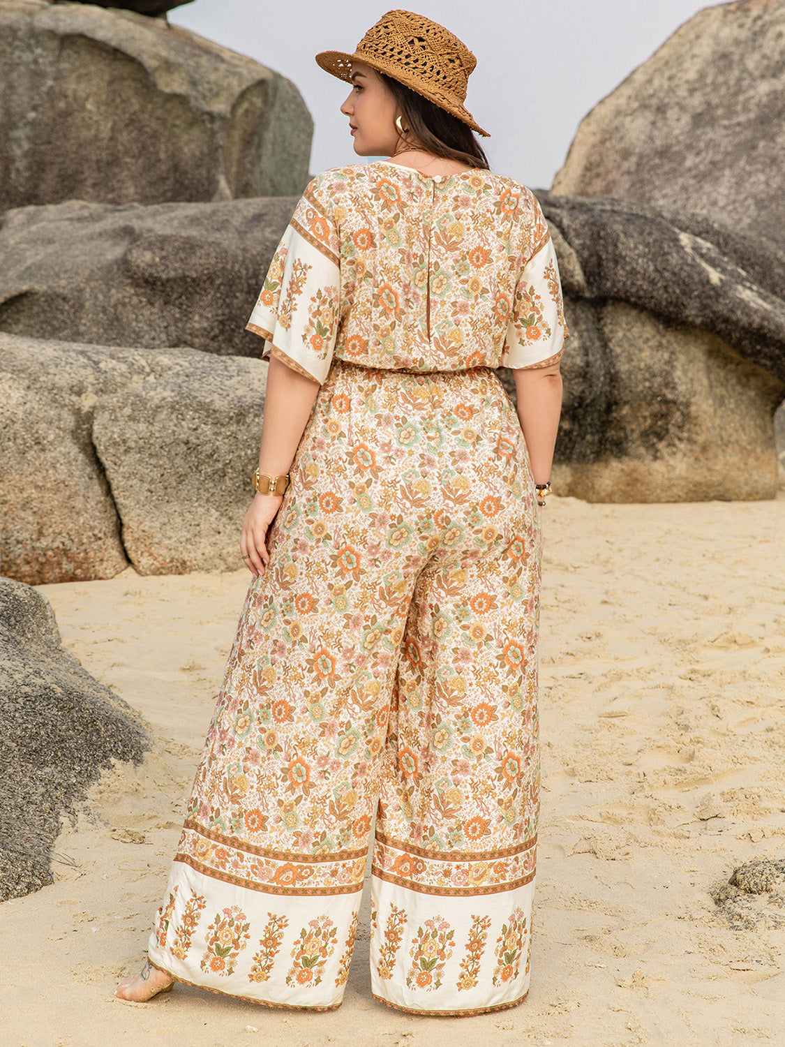 Plus Size V-Neck Flutter Sleeve Wide Leg Jumpsuit - UrbanEthereal