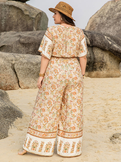 Plus Size V-Neck Flutter Sleeve Wide Leg Jumpsuit - UrbanEthereal