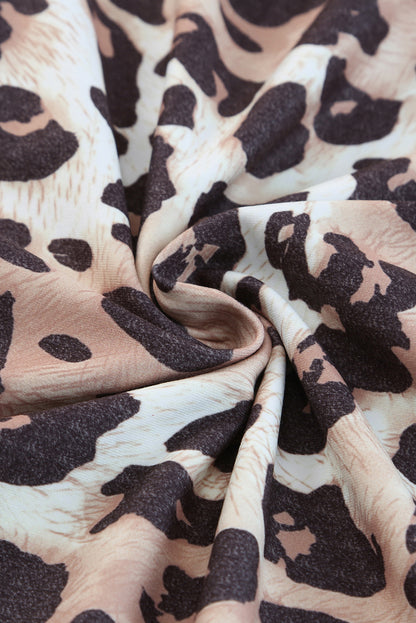 Plus Size Leopard Round Neck Blouse - UrbanEthereal
