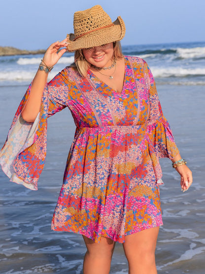 Plus Size Ruched Printed Long Sleeve Dress - UrbanEthereal