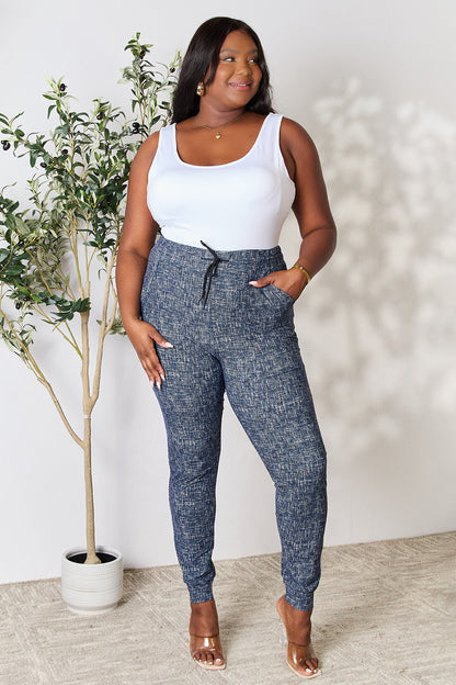 LOVEIT Heathered Drawstring Leggings with Pockets - UrbanEthereal