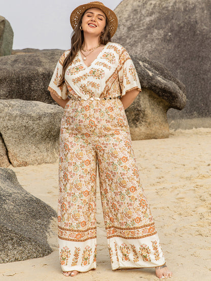 Plus Size V-Neck Flutter Sleeve Wide Leg Jumpsuit - UrbanEthereal
